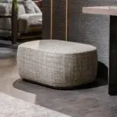 Superior Zanaboni Alma ottoman with gray textile upholstery and gray-stained ash base offers a rounded asymmetrical form
