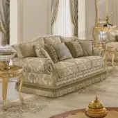 Distinguished Modenese Royal Blend sofa upholstered in cream and gold patterned fabric with satin finish and tassel fringe