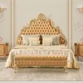 Lavish Modenese Royal Blend bed crafted in Italy with luminous champagne satin upholstery and heavily gilded wood carvings