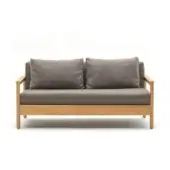 Distinguished Varaschin Bali sofa with comfortable gray textile cushions and plantation-certified solid teak frame