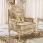 Exquisite Modenese Imperial Majesty lounge chair with plush damask upholstery and glossy gold finished wood frame