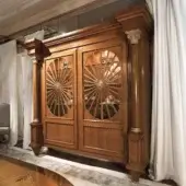 Superior Provasi 1221 bookcase built in wood with reddish-brown satin sheen and sunburst radial detailing