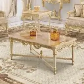 Exquisite Modenese Imperial Majesty coffee table with Honey Onyx top and gold-leaf decorated, carved wooden base in satin and glossy finish