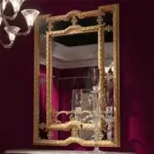 Distinguished Provasi 1107 mirror crafted in Italy with wooden frame and reflective glass panel in antique gold light patina