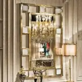 Superior Provasi 1607 mirror crafted in Italy with a bold brass frame and integrated marble details in luminous golden finish