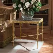 Superior Provasi 1138 side table with polished brass base and dark marble top crafted in Italy