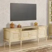 Exquisite Modenese Imperial Majesty TV stand crafted in ivory with intricate gold detailing and hand-carved embellishments