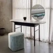 Distinguished Carpanese Home Delorean vanity with shaped matt marble surface and slender ash wood legs in dark matte finish