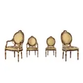 Distinguished Armando Rho 1293 chair handcrafted in wood with walnut tone and black detailing, upholstered in gold, cream, olive floral textile with gold leaf accents