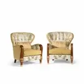 Distinguished Armando Rho A1266 lounge chair with yellow, beige, and blue floral textile and gold leaf mahogany frame
