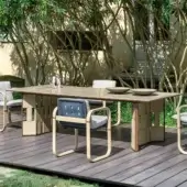 Distinguished Giorgetti Break table crafted with carob aluminum, stainless steel and warm ash wood with an Etna lava stone insert
