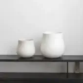 Distinguished Rina Menardi Delos vase crafted from baked clay in Italy with smooth matte ceramic and organic silhouette