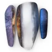 Glass decorated with shades of blue and silvered with various levels of antiquing and copper effect - Luna