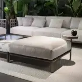Distinguished Giorgetti Aldìa ottoman with waterproof fabric upholstery and a matte gray painted metal base