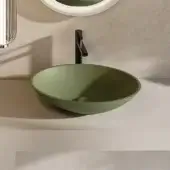 Superior Norah Design EYBA 01 washbasin sculpted from Norahcryl with a matte olive green finish and gentle oval form