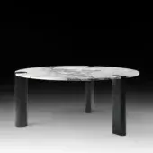 Exceptional Black Tie Amoris table crafted from marble and quartzite with polished finish and uniquely angled cutouts