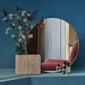 Distinguished Tìam Mirror Pot vessel crafted from textured stone material with warm beige tone and natural veining