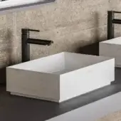 Architectural Norah Design CUBA 01-02 washbasin crafted in white Norahcryl with subtle grey and pale yellow veining and a smooth finish