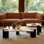 Captivating Black Tie Amoris coffee table crafted with marble and quartzite in light beige and deep black with matte finish