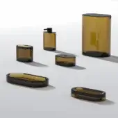 Architectural Norah Design Lisbona bathroom set crafted in luminous Norahcrystal with a glossy warm amber tone and matte black base