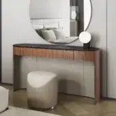 Distinguished Capital Clori vanity with warm brown wood veneer and striking dark marble, showcasing a refined, curved silhouette