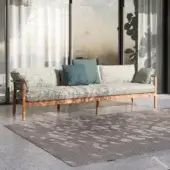 Sophisticated Atmosphera Panama sofa with subtly patterned muted gray textile and refined linear teak frame