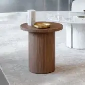 Distinguished Capital Icaro side table crafted in wood with a satin finish and subtle gold-toned bowl