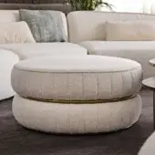 Exceptional Black Tie Lillo ottoman with creamy bouclé textile upholstery and slender metal ring, crafted with ribbed stitching
