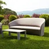 Distinguished Serralunga Pine Beach sofa crafted in warm beige recyclable LLDPE with a matte finish for inviting comfort