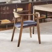 Superior Porada Frida armchair with sculpted solid canaletto walnut frame and comfortable blue-grey upholstery in satin finish