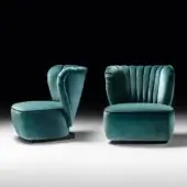 Exceptional Black Tie Amelia lounge chair upholstered in textured matte velvet with sculpted pleated backrest and integrated dark base