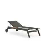 Elegant Atmosphera Nevada chaise lounge crafted with graphite aluminum and warm teak inserts for relaxing comfort