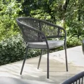 Exceptional Atmosphera Pleasure armchair with sculpted aluminum and woven rope in a dark gray finish