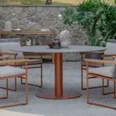 Superior Atmosphera Arena round table with smooth medium gray gres and reddish-brown cylindrical base construction