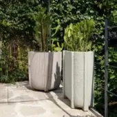 Superior Serralunga Cassero planter with pale green concrete-effect LLDPE and subtle vertical ridging