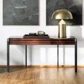 Elegant Capital Mayfair console with a glossy reddish-brown striped pattern and sleek matte black metal legs crafted in Italy
