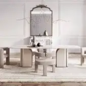 Distinguished Capital Duna table with elongated white marble tabletop and light beige smooth-finished gracefully curved base