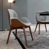 Exceptional Tonin Casa Sorrento Ésprit armchair in mottled gray textile with tan detailing and satin-finish wood frame
