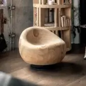 Lavish Riva 1920 Maui lounge chair sculpted from solid scented Lebanon cedar with a dark iron base and visible knot