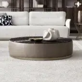 Elegant Capital Étoile coffee table with dark gray-black veined marble and neutral beige leather-wrapped base