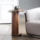 Exceptional Capital Celine side table crafted in wood with a glossy finish and delicate metal rings