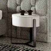 Distinctive Capital Aurea nightstand with circular silhouette and sleek metallic base crafted in matte off-white lacquer
