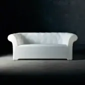 Elegant Serralunga Sirchester sofa crafted from glossy white LLDPE plastic with deeply button-tufted design for comfortable outdoor living