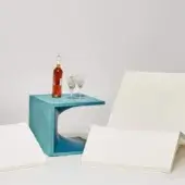 Superior Serralunga Aquaplano side table in teal blue recyclable plastic with a sleek matte finish and geometric cutouts