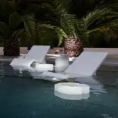 Distinguished Serralunga Aqua Lounger lounger crafted in white recyclable LLDPE with subtle green undertones and a glossy finish