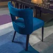 Distinguished Costantini Pietro Bess chair with deep blue velvet upholstery and dark-finished wood frame presents a refined silhouette