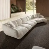 Timeless Lago Not Only White sectional in crisp white nubby textile with sculptural low‑profile silhouette