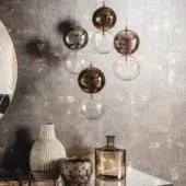 Superior Cattelan Italia Apollo suspension lamp presents layered borosilicate glass spheres with painted chrome and transparent glass arrangements