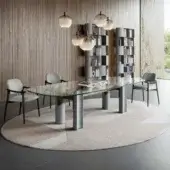 Luxury Cattelan Italia Bilbao Glass Table with clear glass top green edge and matte concrete base with asymmetrical columns