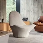 Elegant Ditre Italia Manta lounge chair upholstered in textured taupe textile with matte finish, steel frame and metal base